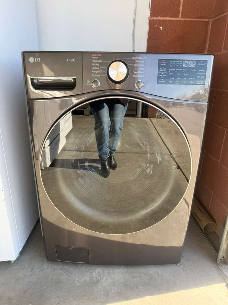 NEW Scratch & Dent LG 4.5 cu. ft. High-Efficiency Stackable Smart Front-Load Washer with Steam & Built-In Intelligence in Black Steel!